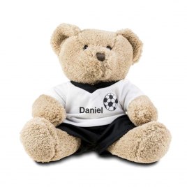 Teddybjörn som bär fotbollströja med namn